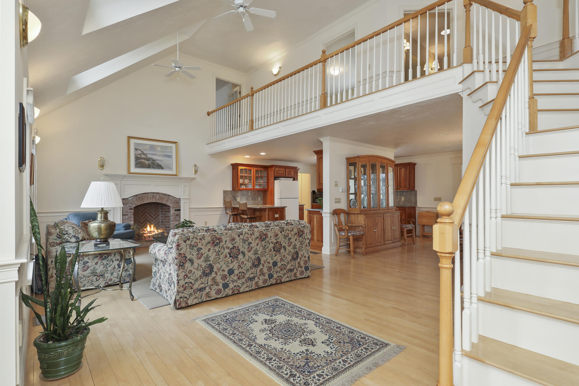 5 Scargo Heights Road Dennis, MA 02638 - Photo 2 of 29 a living room with furniture and a fireplace