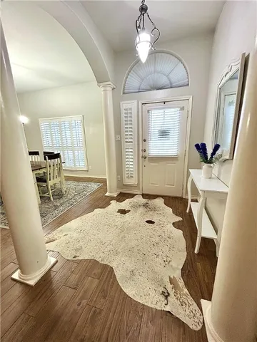 a bedroom with a bed and furniture