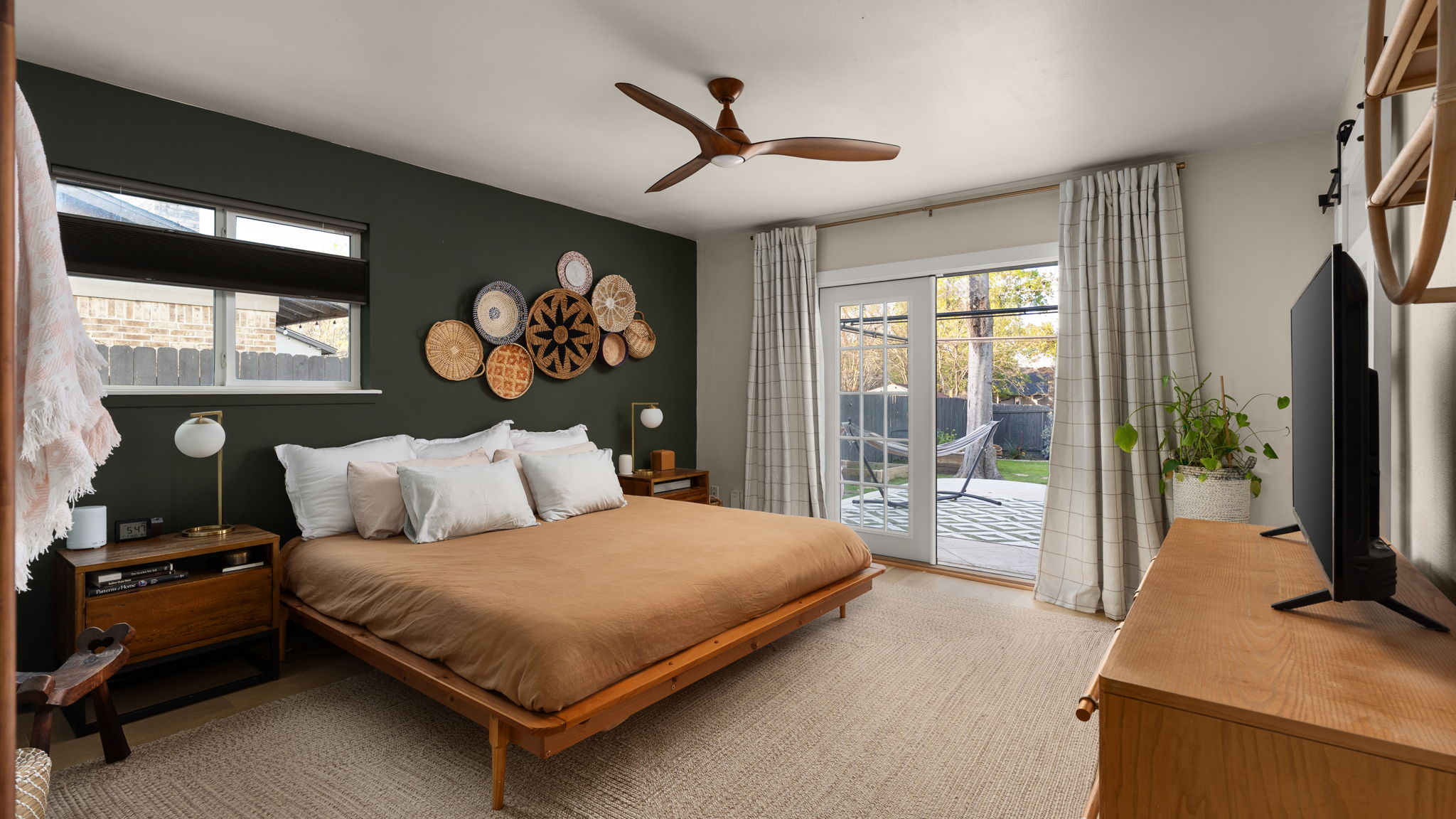 1602 Thornridge Road Austin, TX 78758 - Photo 3 of 39 Bedroom featuring access to exterior and ceiling fan