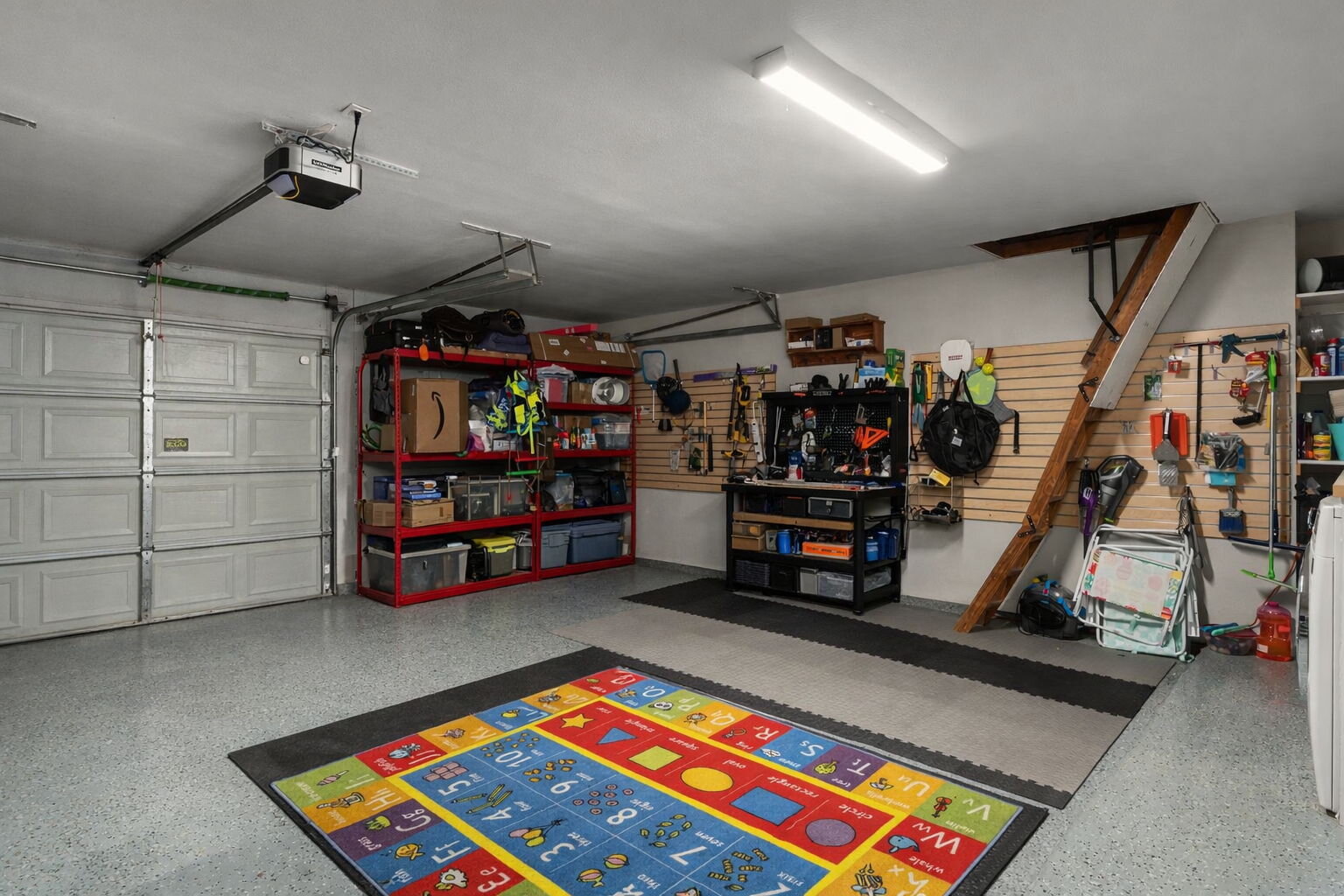 1602 Thornridge Road Austin, TX 78758 - Photo 39 of 39 Garage featuring a garage door opener