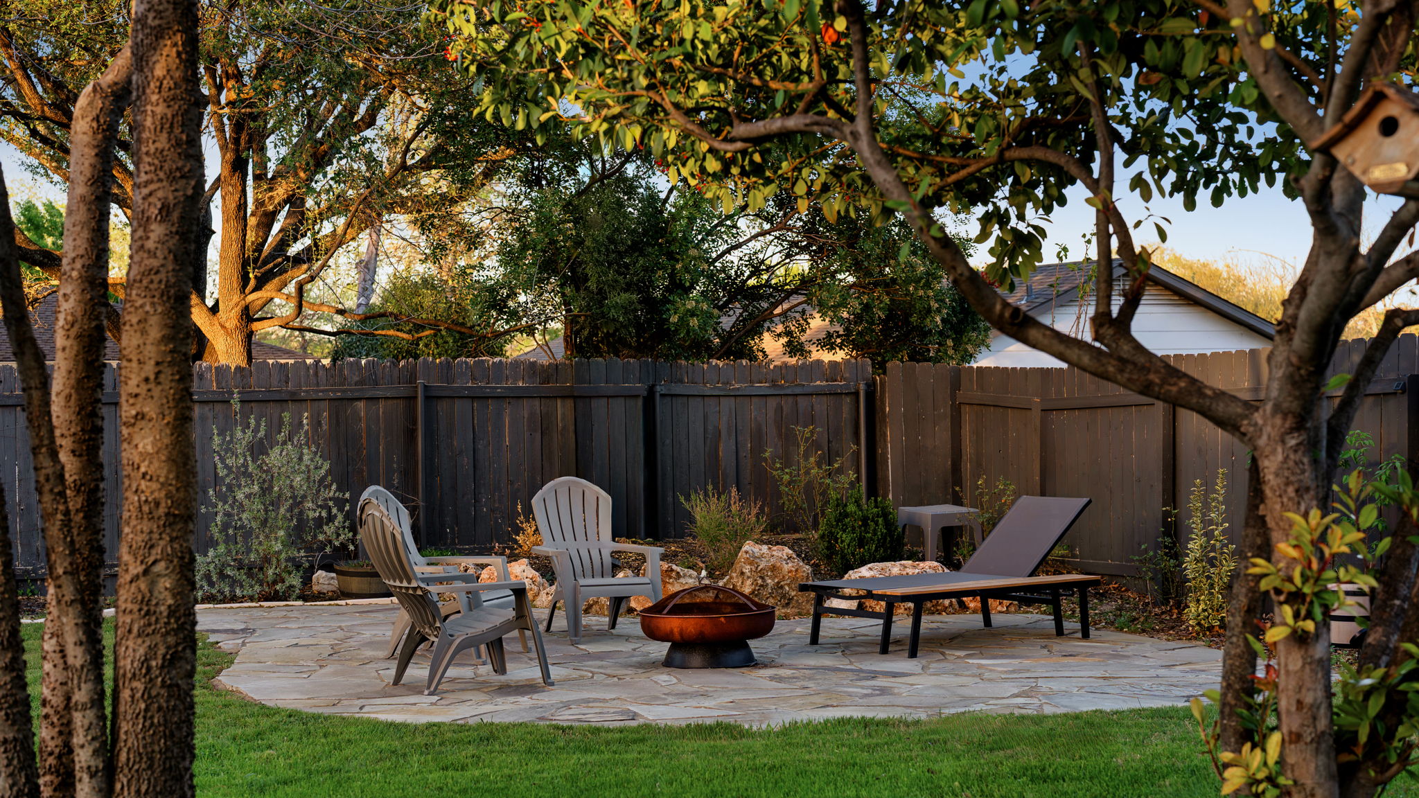 1602 Thornridge Road Austin, TX 78758 - Photo 5 of 39 Fenced backyard with a patio and a fire pit