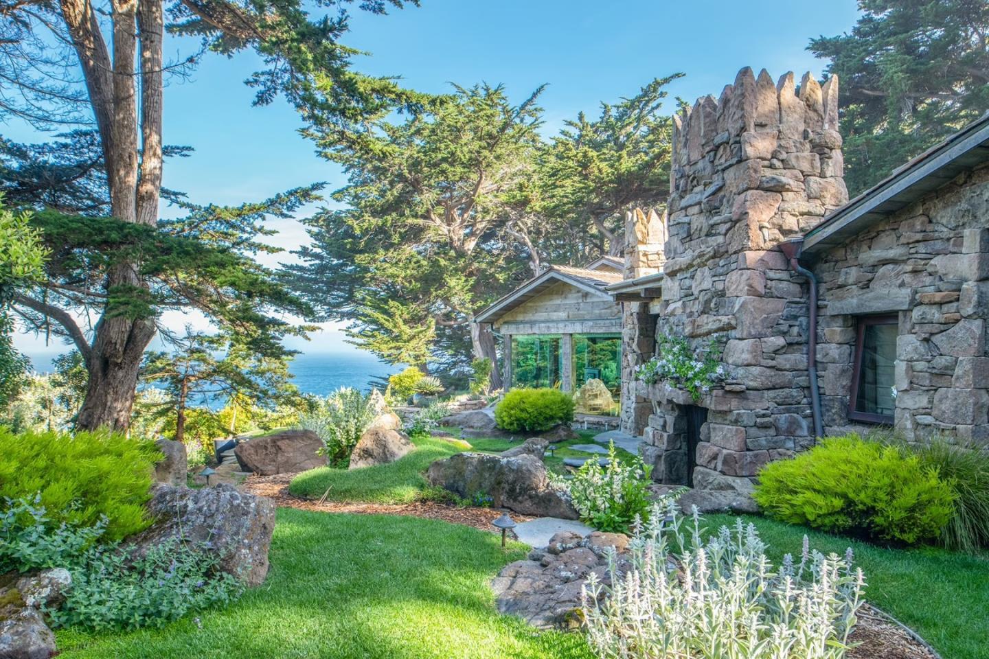 157-163 Spindrift Road Carmel, CA 93923 - Photo 21 of 100 a front view of a house with garden