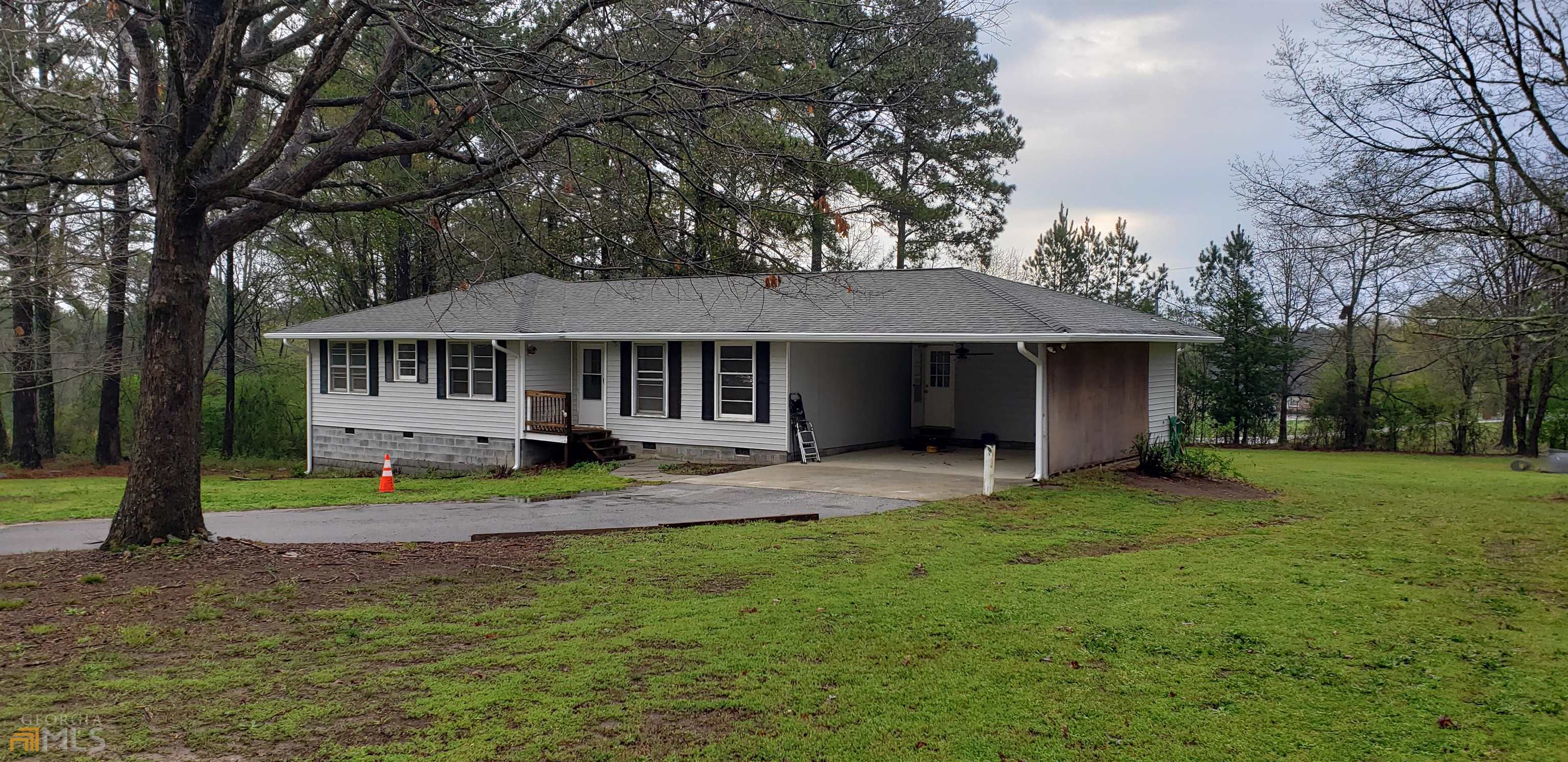 4805 Cook Road Southwest Stockbridge, GA 30281 - Photo 1 of 1 front view of a house with a yard
