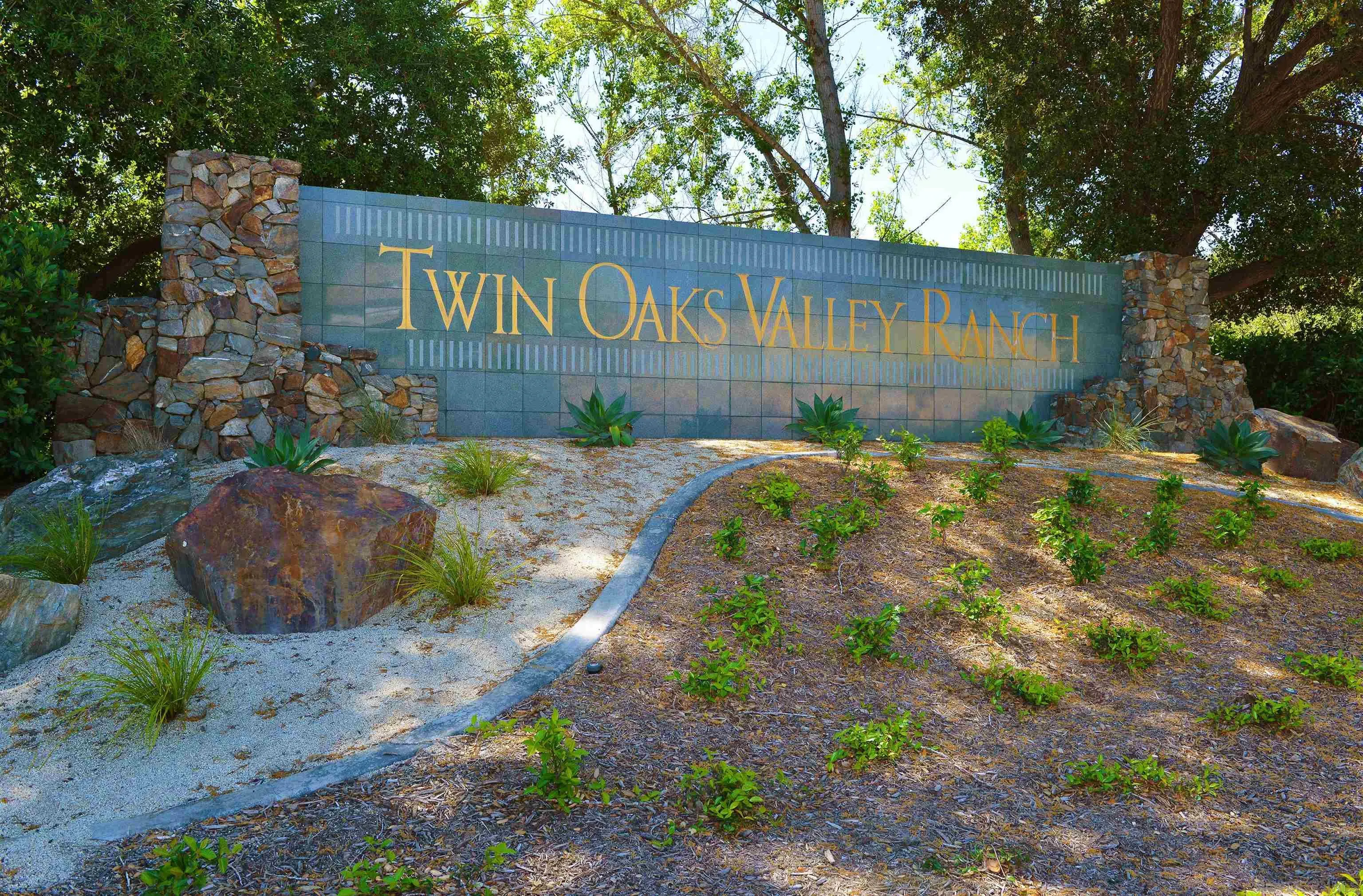 1783 Medinah Road San Marcos, CA 92069 - Photo 34 of 39 a view of a street sign under a large tree