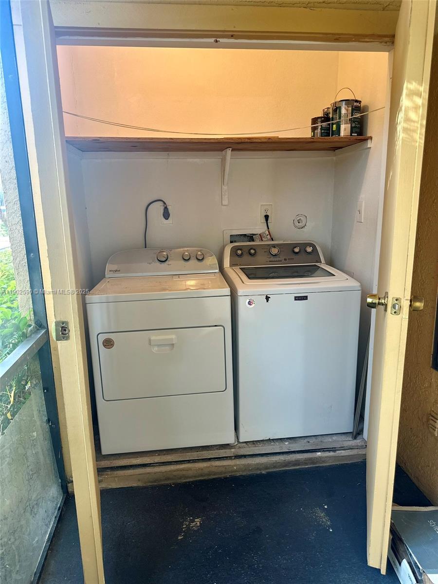 10581 Southwest 155th Court, Unit 1214 Miami, FL 33196 - Photo 26 of 35 a utility room with dryer and washer