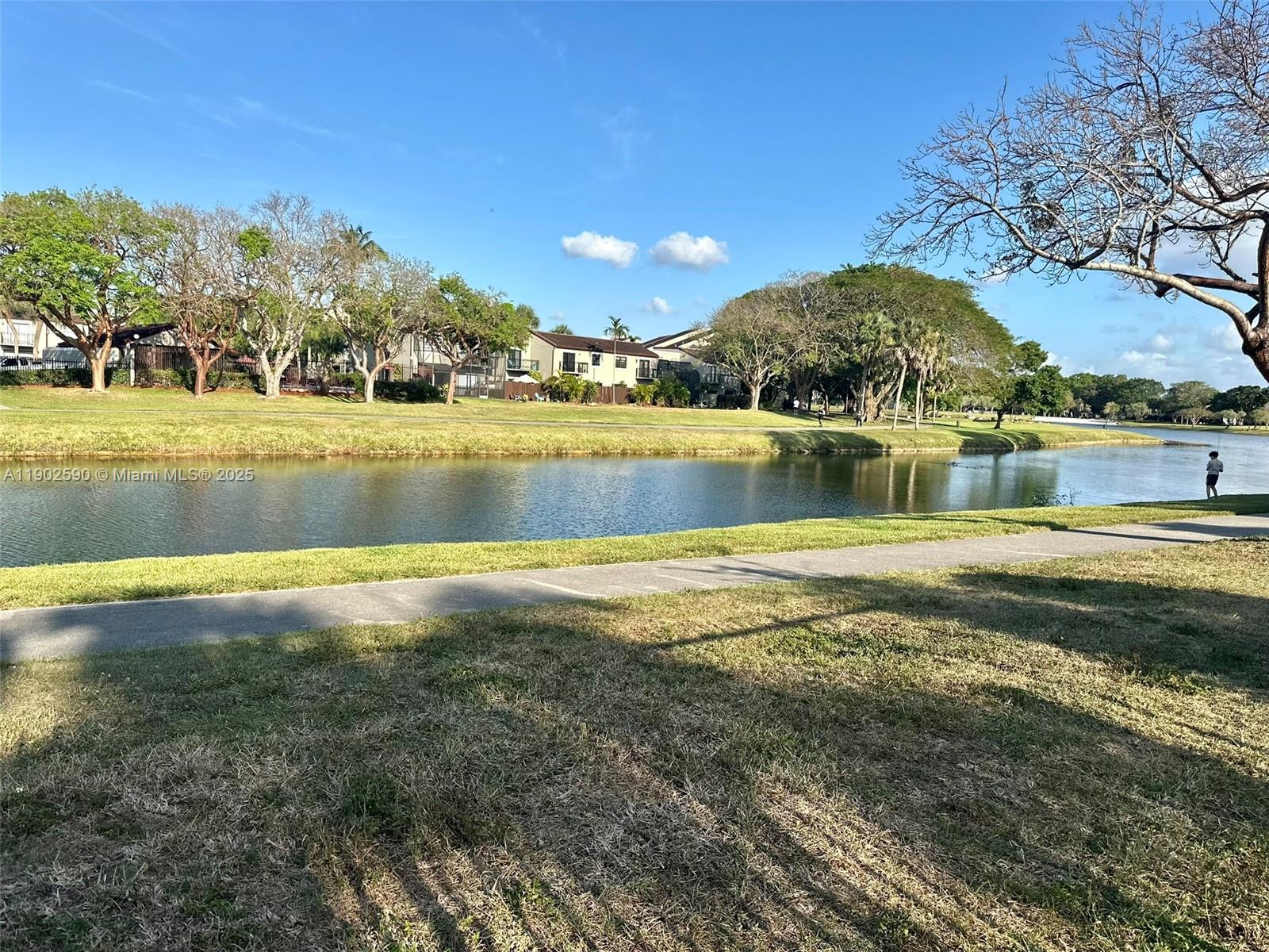 10581 Southwest 155th Court, Unit 1214 Miami, FL 33196 - Photo 30 of 35 a view of pool and lake view