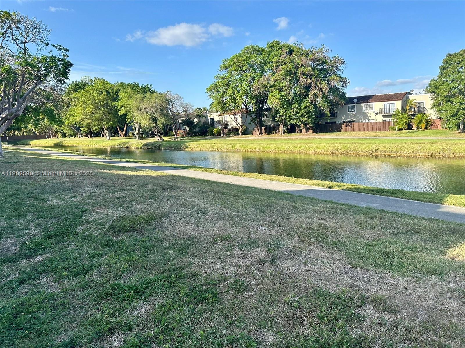 10581 Southwest 155th Court, Unit 1214 Miami, FL 33196 - Photo 31 of 35 a view of a lake view