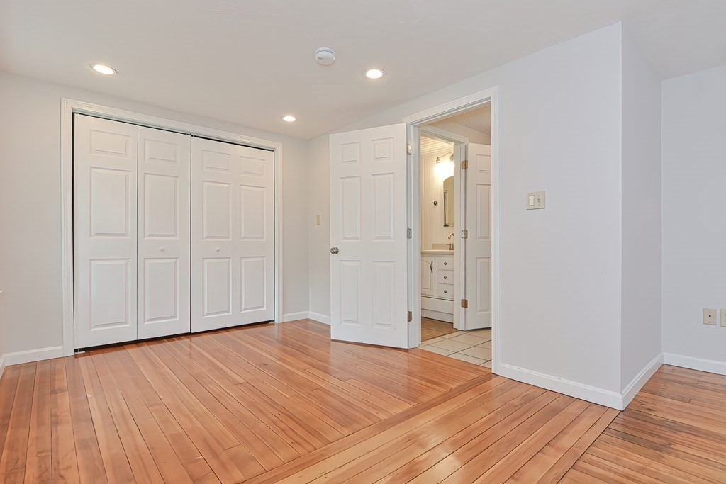 3 Zina Road Hudson, MA 01749 - Photo 18 of 41 a view of empty room with wooden floor