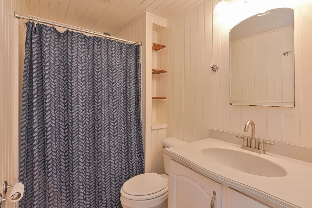 3 Zina Road Hudson, MA 01749 - Photo 19 of 41 a bathroom with a sink toilet and shower