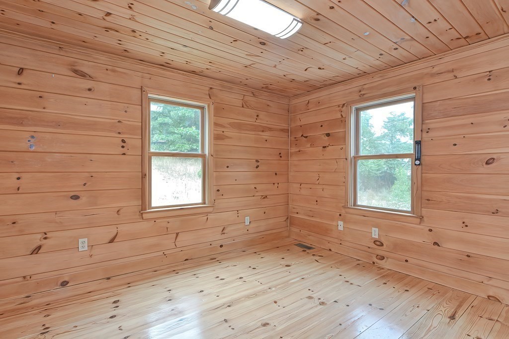 3 Zina Road Hudson, MA 01749 - Photo 20 of 41 a view of a room with a window and wooden floor