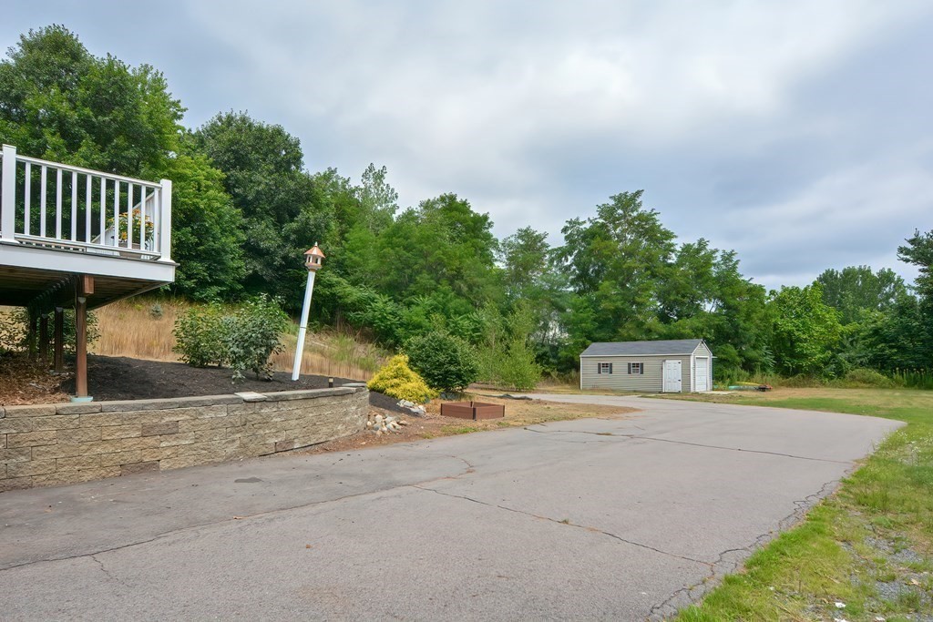 3 Zina Road Hudson, MA 01749 - Photo 31 of 41 a view of a house with backyard and sitting area