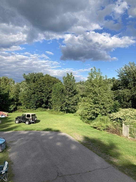 3 Zina Road Hudson, MA 01749 - Photo 34 of 41 a car parked in the middle of a park