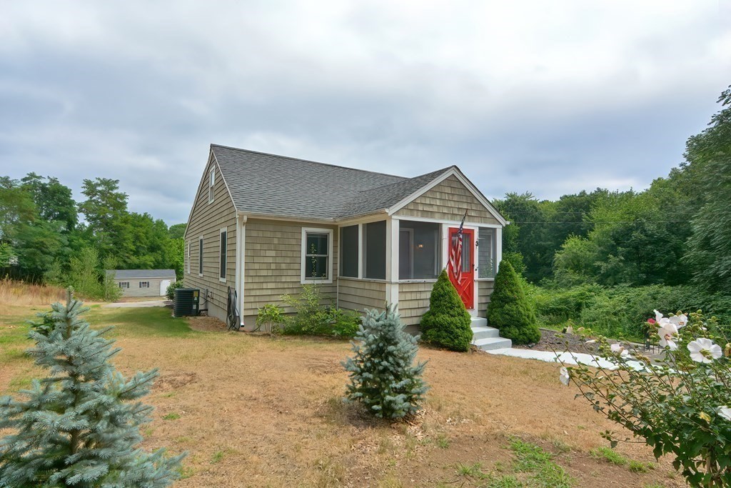 3 Zina Road Hudson, MA 01749 - Photo 37 of 41 a front view of a house with garden
