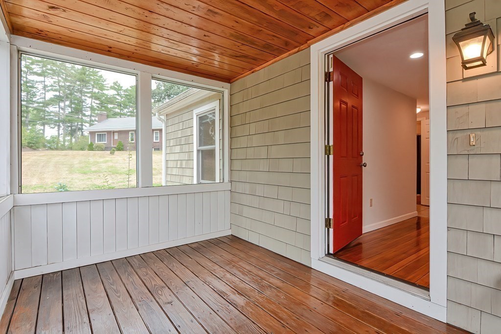 3 Zina Road Hudson, MA 01749 - Photo 5 of 41 a view of empty room with wooden floor and fan