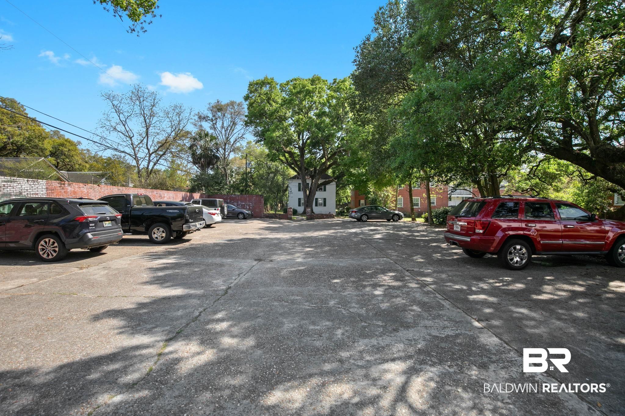 214 Upham Street, Unit 8D Mobile, AL 36607 - Photo 29 of 36 View of uncovered parking lot