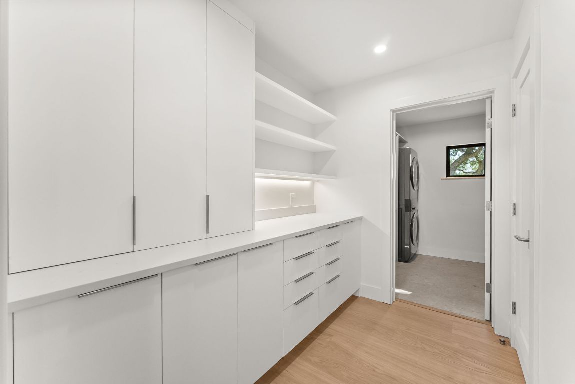8717 South View Road Austin, TX 78737 - Photo 26 of 38 a view of an empty walk in closet