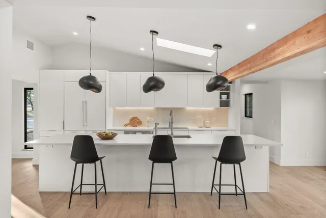 a view of kitchen and dining area with furniture