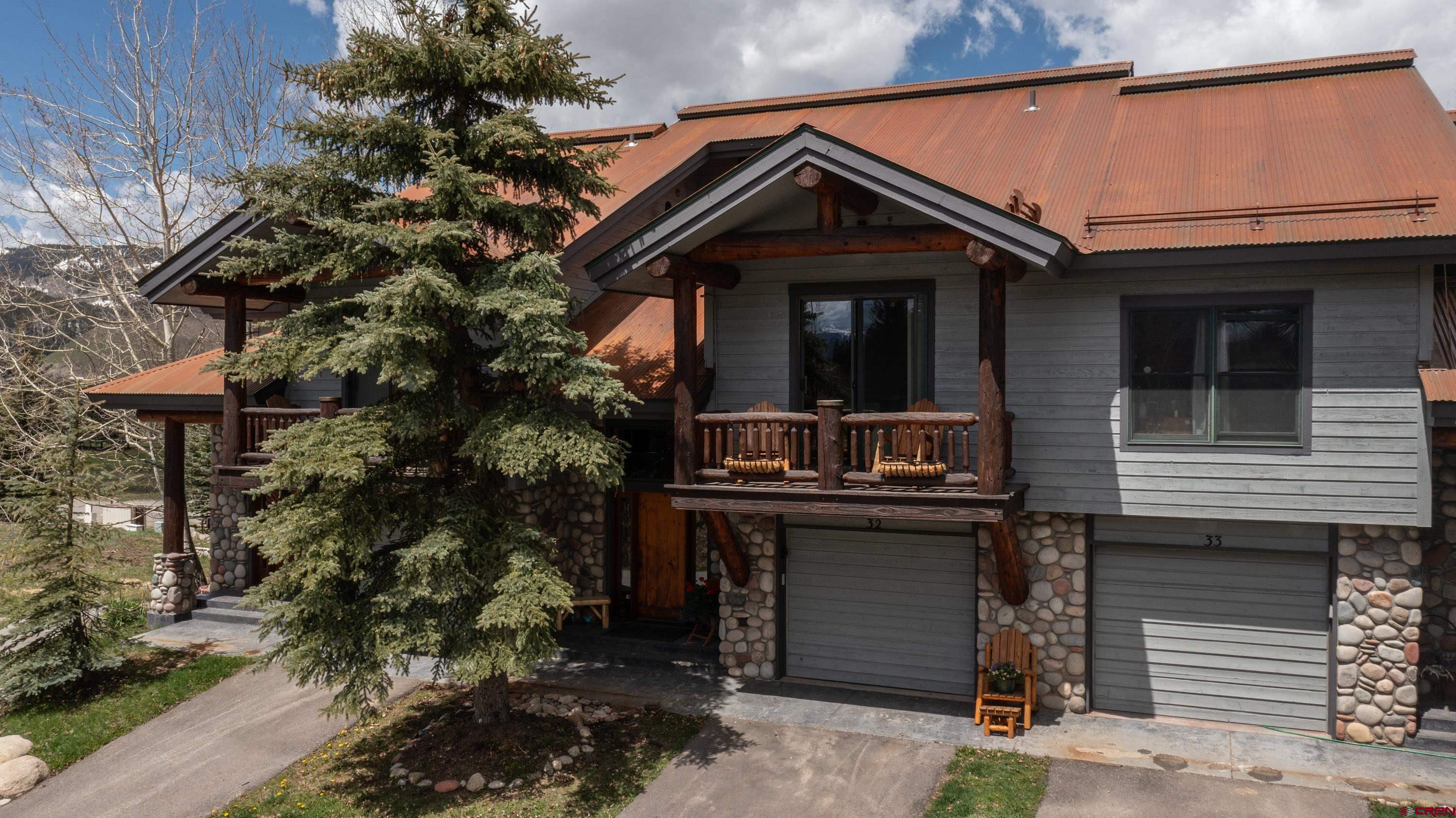 32 St Andrew's Circle Crested Butte, CO 81224 - Photo 4 of 35 a front view of a house