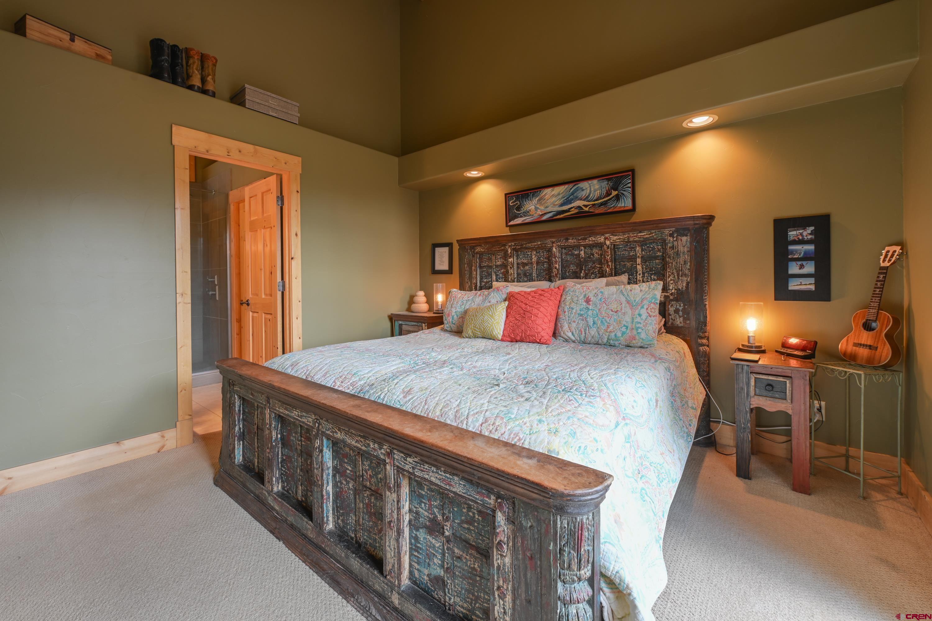32 St Andrew's Circle Crested Butte, CO 81224 - Photo 6 of 35 a bedroom with a bed and window