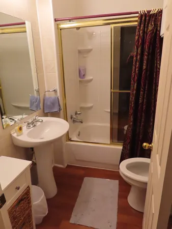 a bathroom with a sink and toilet