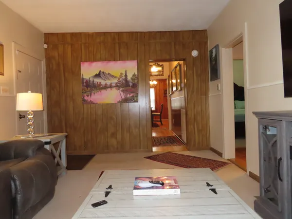 a bedroom with a bed and a couch