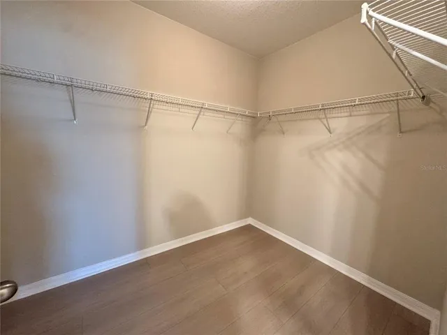 a view of a room with racks on the wall