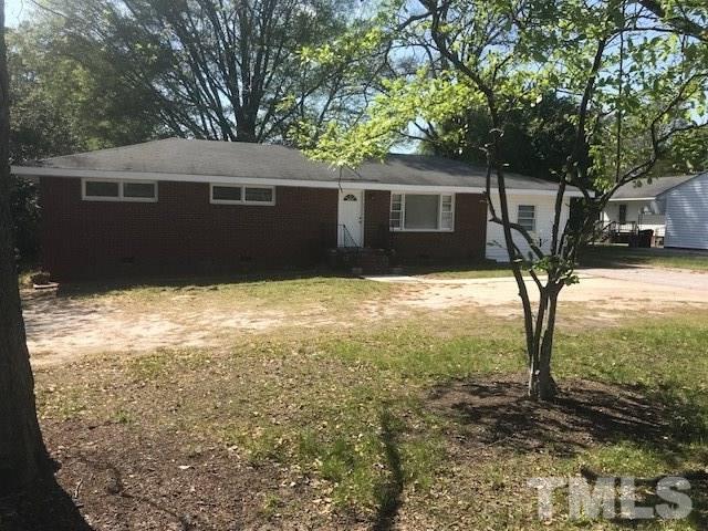 2901 North New Hope Road Raleigh, NC 27604 - Photo 1 of 13 a view of a house with a yard