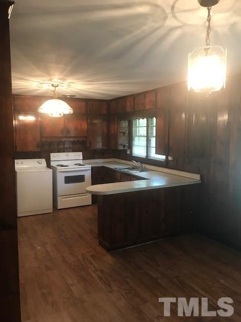 2901 North New Hope Road Raleigh, NC 27604 - Photo 5 of 13 a view of kitchen with granite countertop window and stainless steel appliances