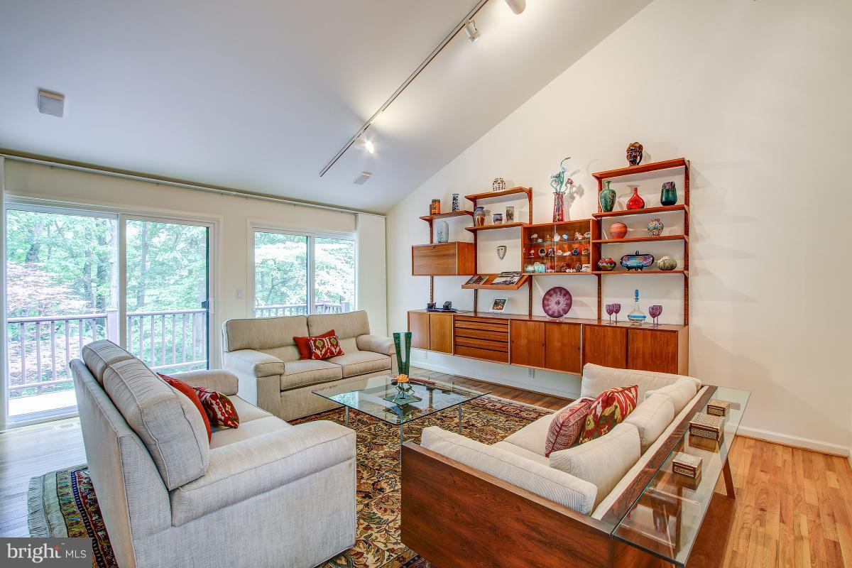 11105 Glade Drive Reston, VA 20191 - Photo 12 of 30 A wall of glass defines the Living Room!