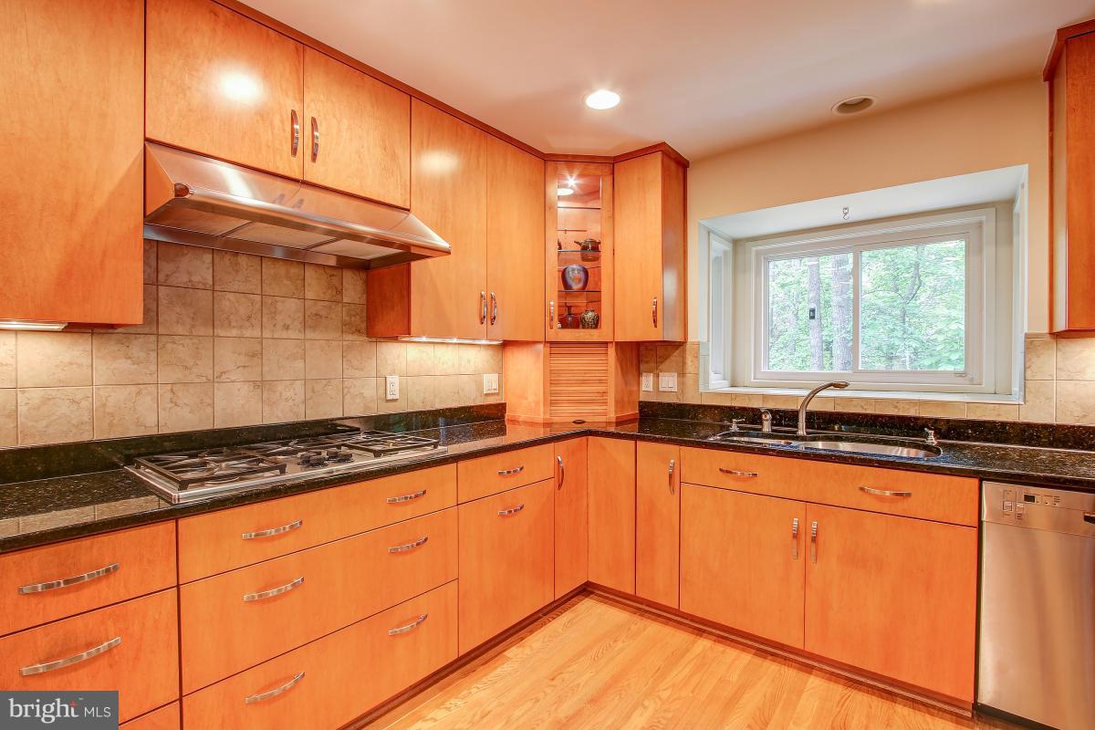 11105 Glade Drive Reston, VA 20191 - Photo 5 of 30 There's a window over the sink to enjoy the yard!