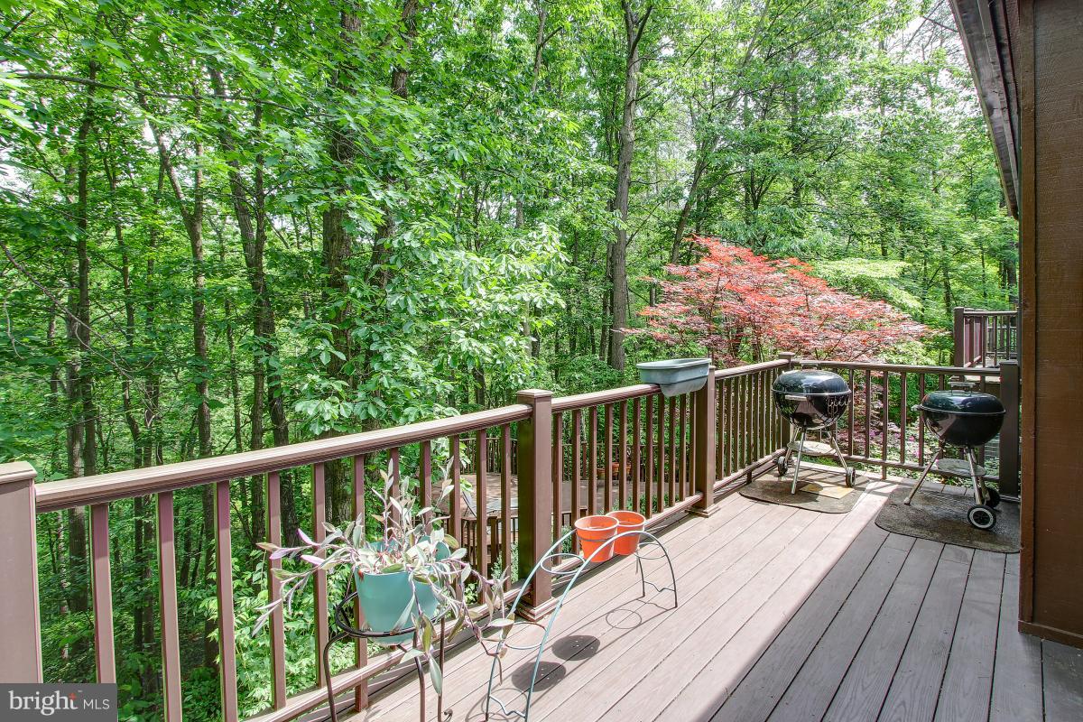 11105 Glade Drive Reston, VA 20191 - Photo 10 of 30 Multiple decks open the home to nature