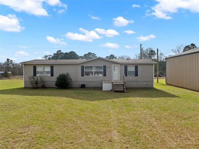 a view of a house with a patio