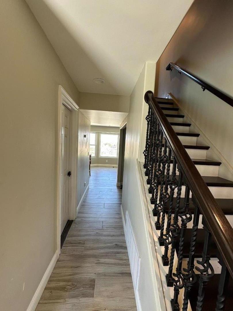 50950 Pine Canyon Road King City, CA 93930 - Photo 14 of 23 wooden floor with staircase and windows