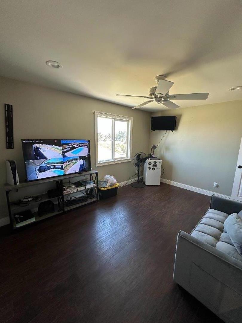 50950 Pine Canyon Road King City, CA 93930 - Photo 7 of 23 a living room with furniture and a flat screen tv