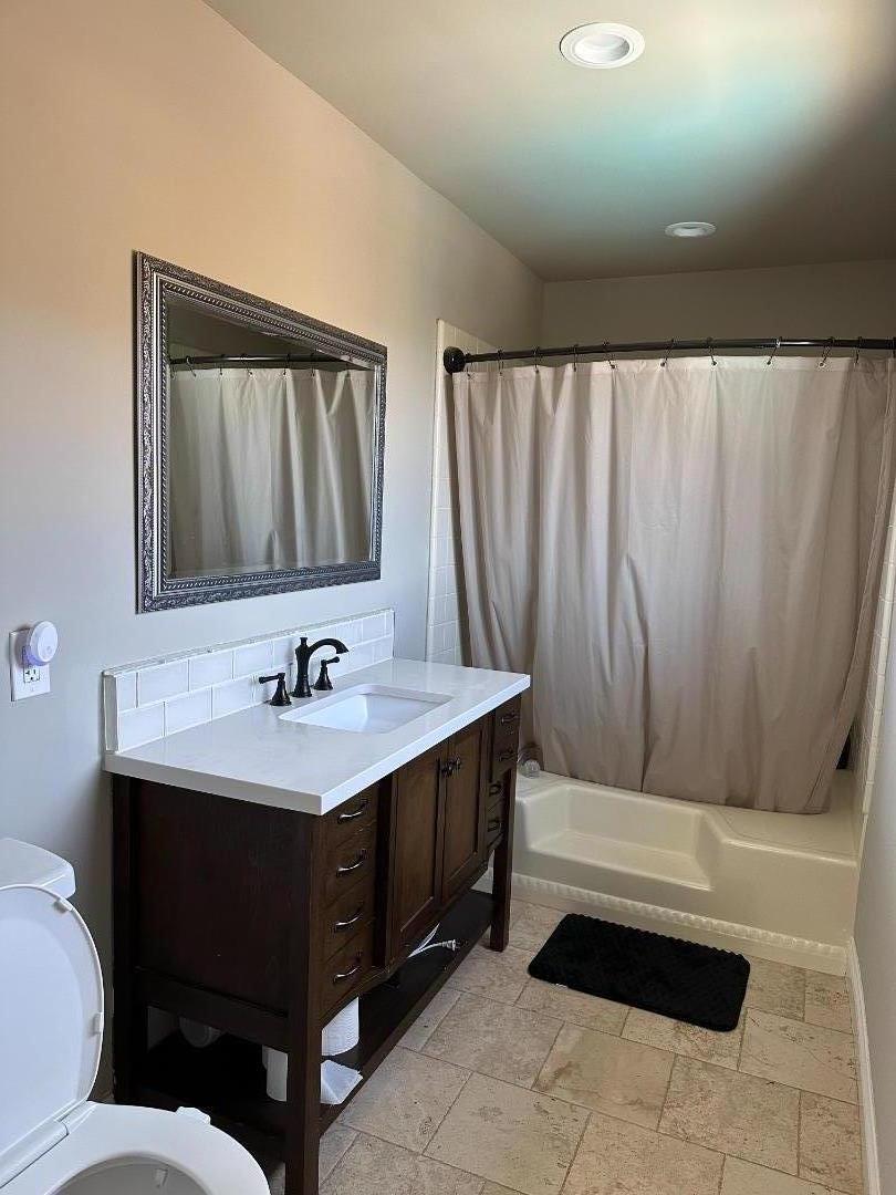 50950 Pine Canyon Road King City, CA 93930 - Photo 10 of 23 a bathroom with a sink a toilet and mirror