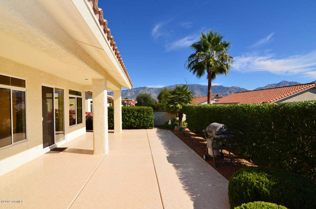 1330 East Crown Ridge Drive Tucson, AZ 85755 - Photo 2 of 22 a view of a house with backyard and porch