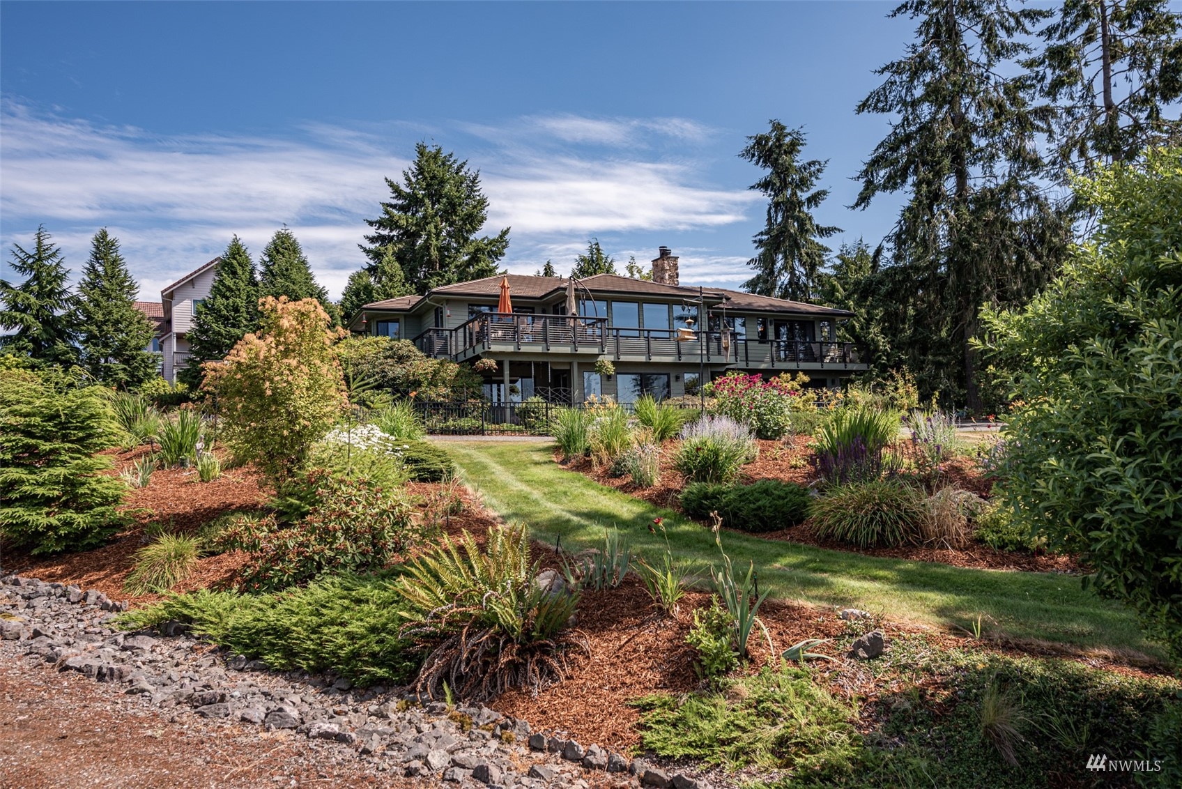 1313 Doe Run Road Sequim, WA 98382 - Photo 1 of 40 a view of a house with a yard