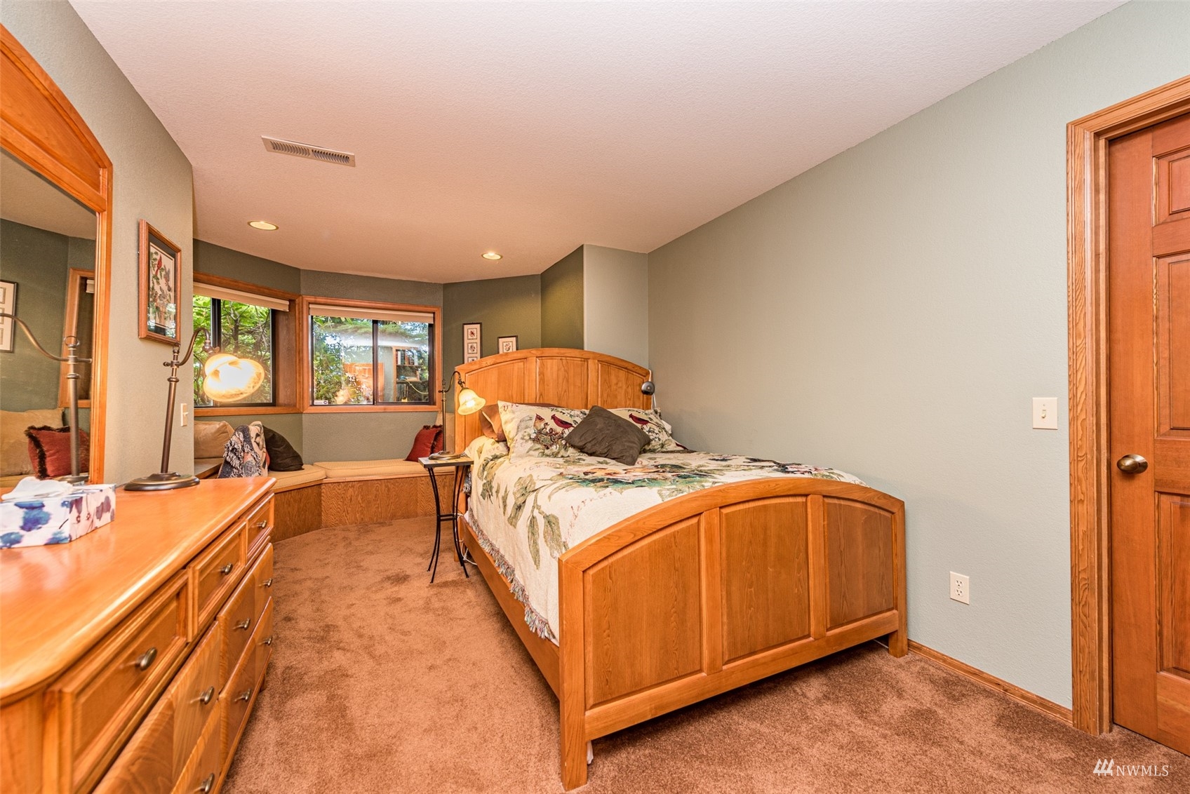 1313 Doe Run Road Sequim, WA 98382 - Photo 26 of 40 a bed room with a bed and window