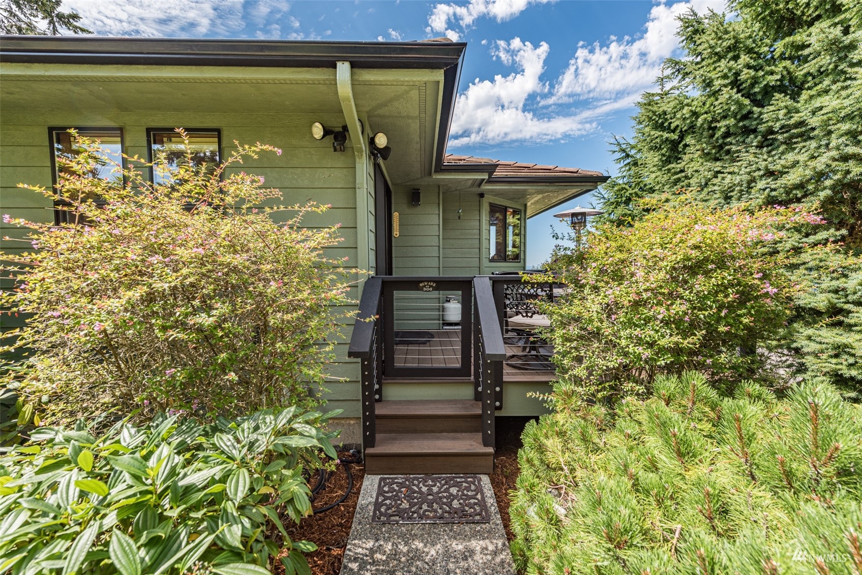 1313 Doe Run Road Sequim, WA 98382 - Photo 29 of 40 a view of a pathway of the house