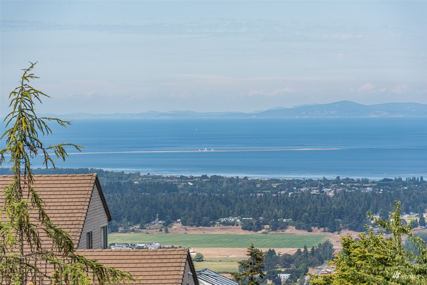 1313 Doe Run Road Sequim, WA 98382 - Photo 3 of 40 an aerial view of a city