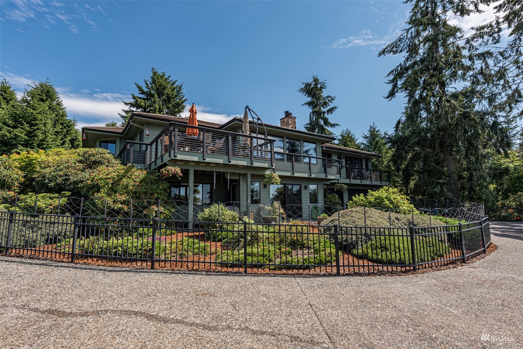 1313 Doe Run Road Sequim, WA 98382 - Photo 38 of 40 front view of a house with a small yard