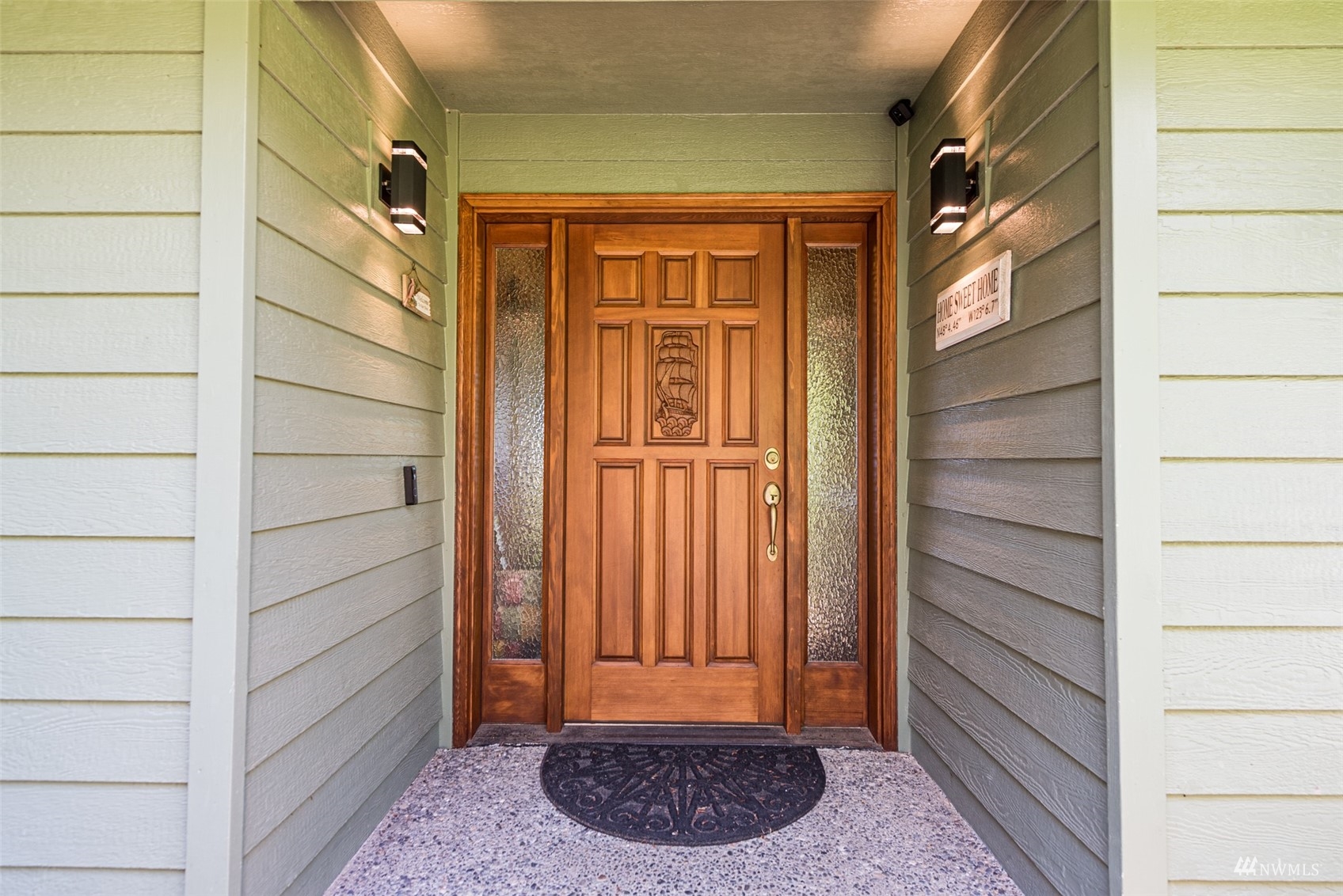 1313 Doe Run Road Sequim, WA 98382 - Photo 5 of 40 a view of front door and bedroom