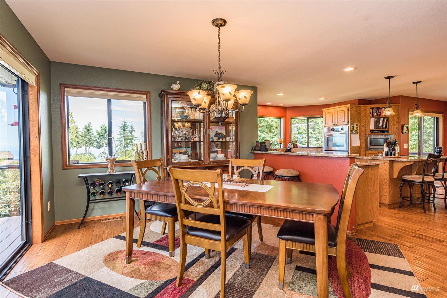 1313 Doe Run Road Sequim, WA 98382 - Photo 9 of 40 a view of a dining room with furniture window and outside view