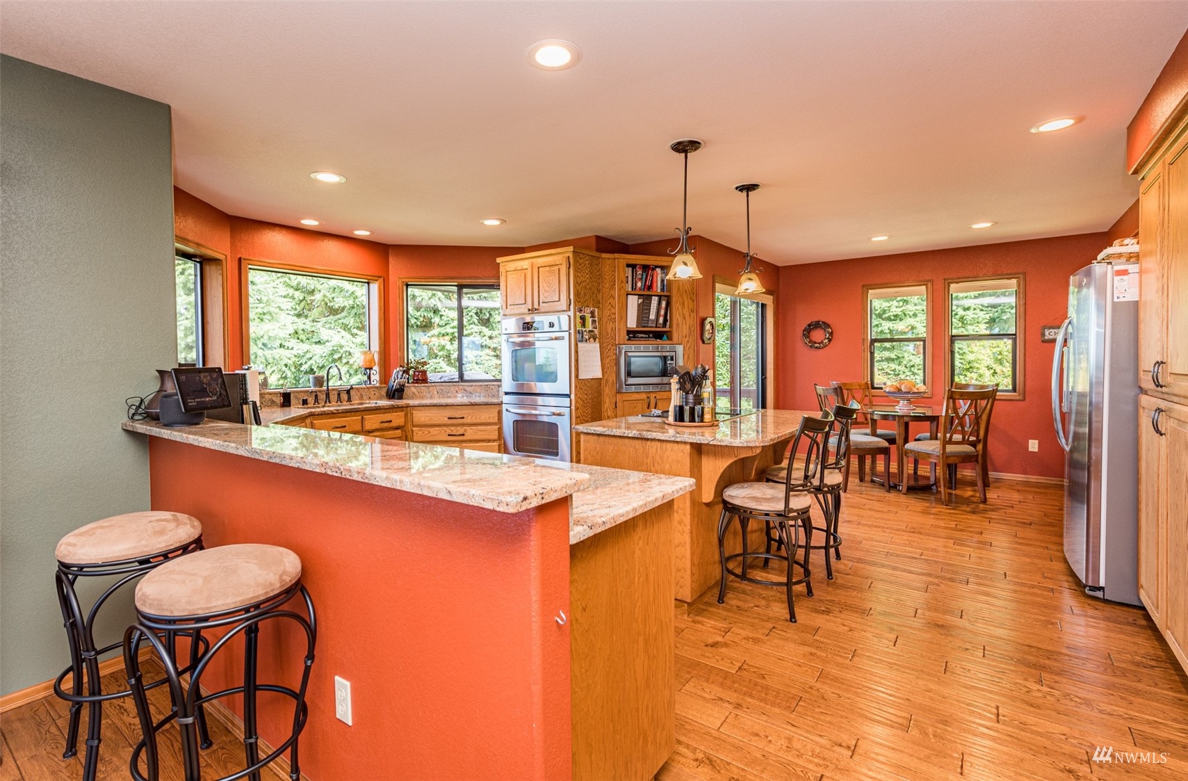 1313 Doe Run Road Sequim, WA 98382 - Photo 10 of 40 a very nice looking dining room with a large dining table and chairs