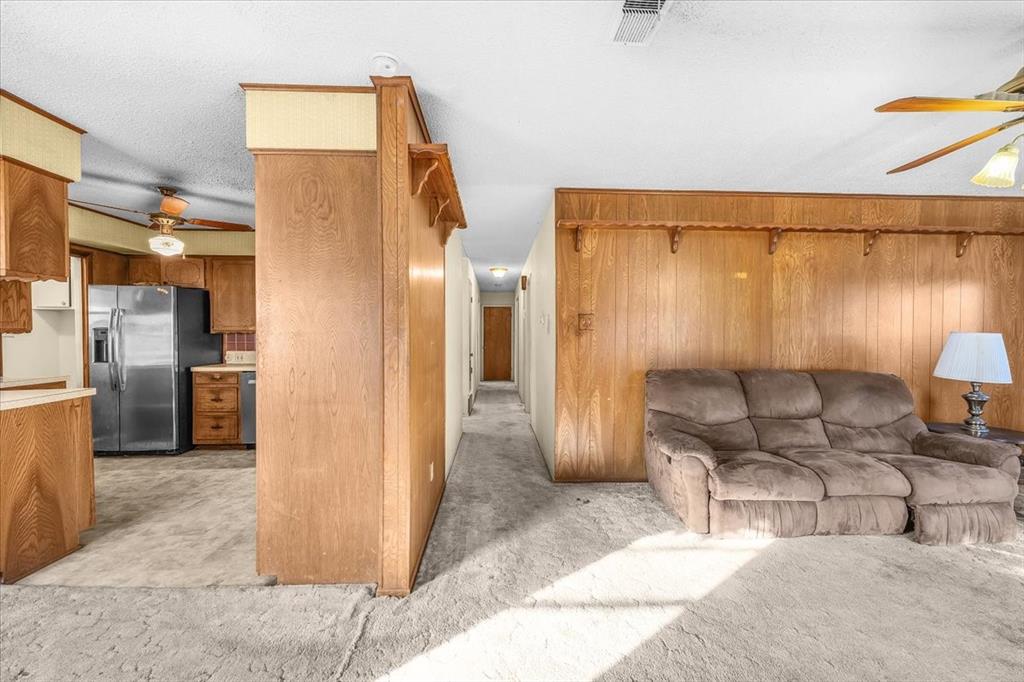601 State Street Weatherford, TX 76086 - Photo 15 of 38 a living room with furniture and a table