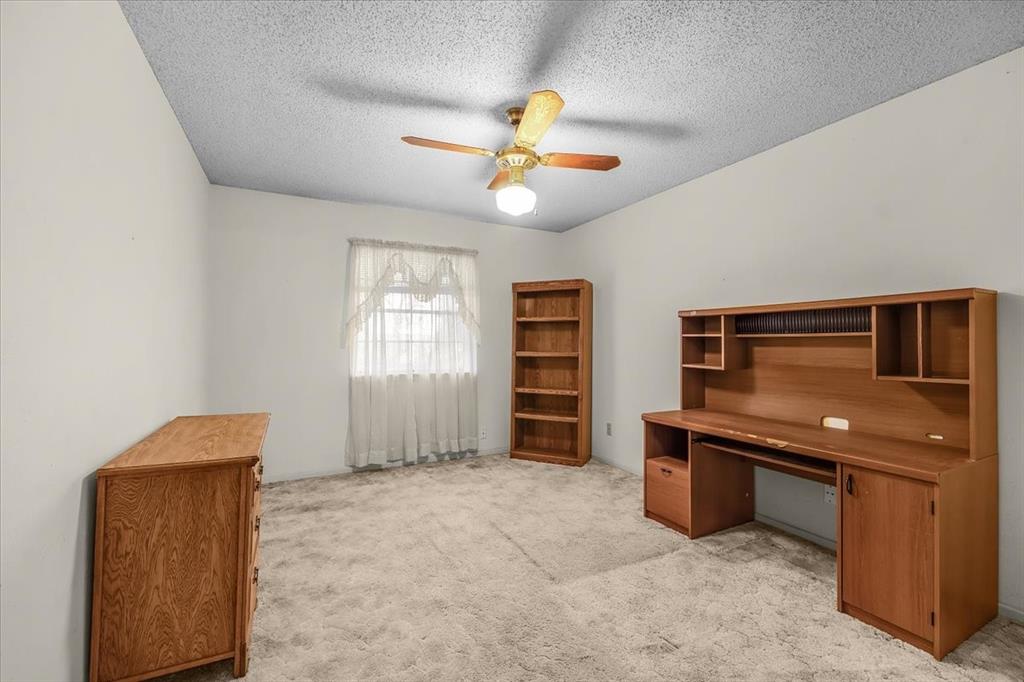 601 State Street Weatherford, TX 76086 - Photo 16 of 38 a view of an empty room with a window