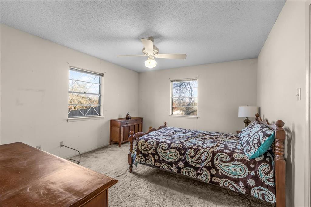 601 State Street Weatherford, TX 76086 - Photo 20 of 38 a bedroom with a bed and a window