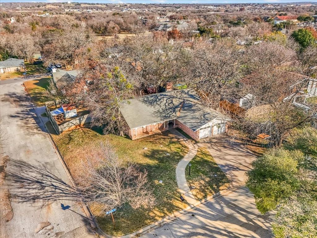 601 State Street Weatherford, TX 76086 - Photo 31 of 38 an aerial view of residential houses with outdoor space