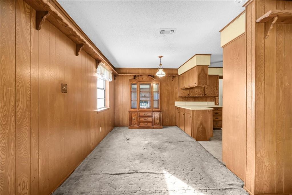 601 State Street Weatherford, TX 76086 - Photo 8 of 38 a bathroom with a sink and a mirror