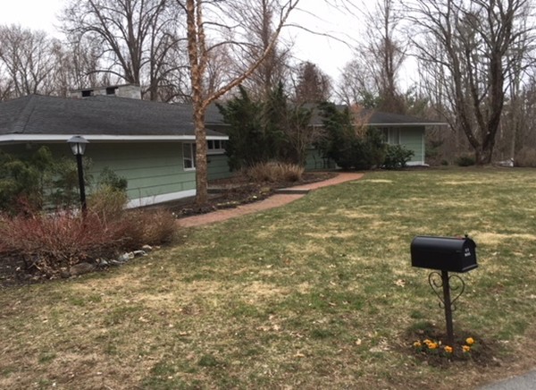 9 West Knoll Road Andover, MA 01810 - Photo 1 of 16 a backyard of a house with lots of green space